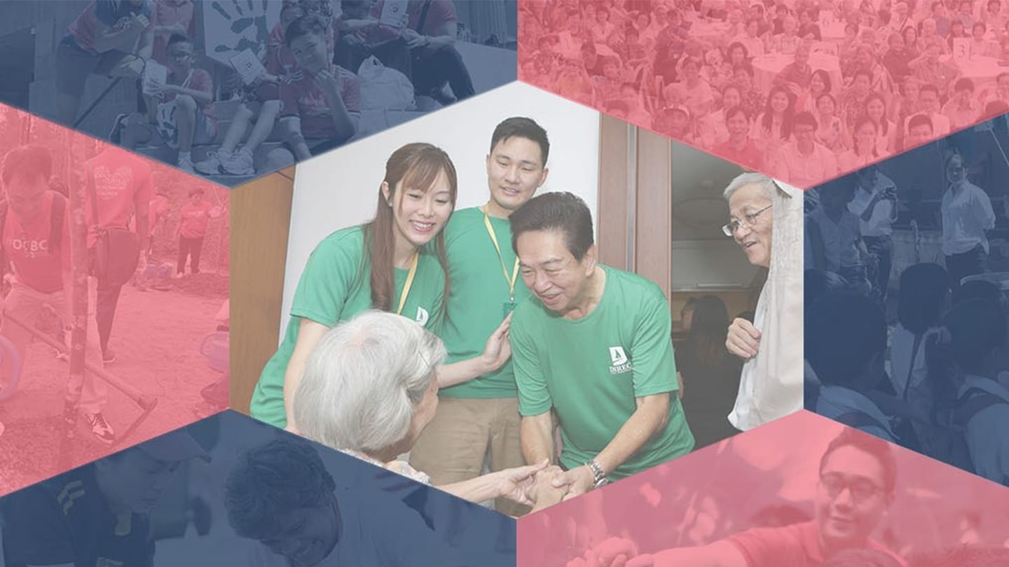 nvpc volunteers in green shirts and elderly beneficiary