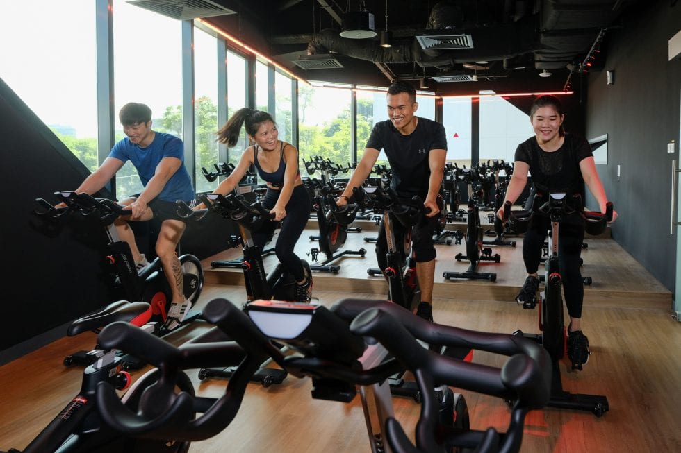 spin class with two females and two males