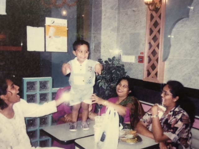 Yung Raja as a child entertaining his family