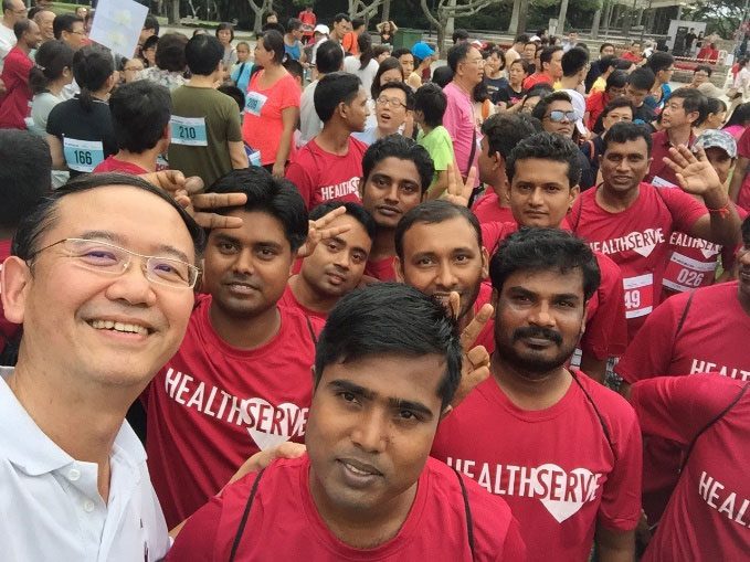 Wei leong with HealthServe Migrant Workers at an event
